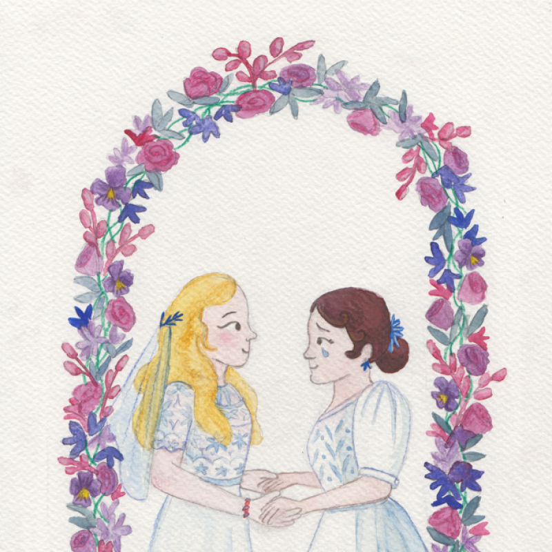 Two brides, dressed in white, are gazing lovingly at each other, surrounded by an arch of flowers. One is crying tears of joy.