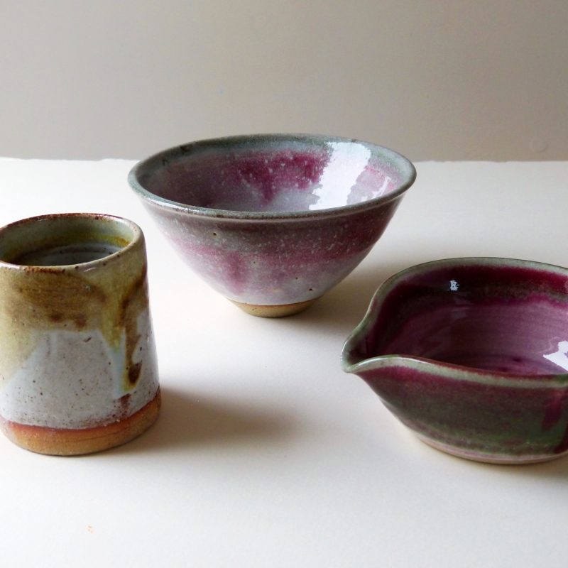 A cup and 2 small bowls