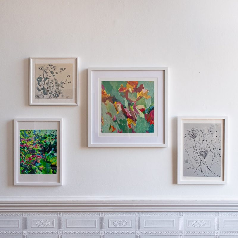 A photograph of Clara Wilkinson's prints on the wall of her open house
