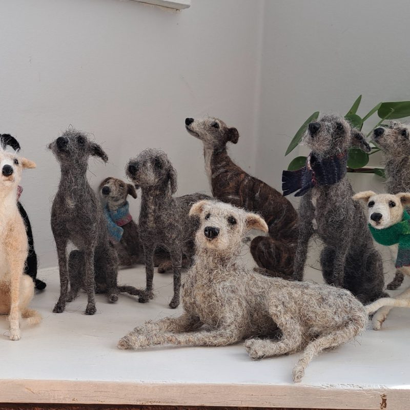 A pack of needle felted dogs