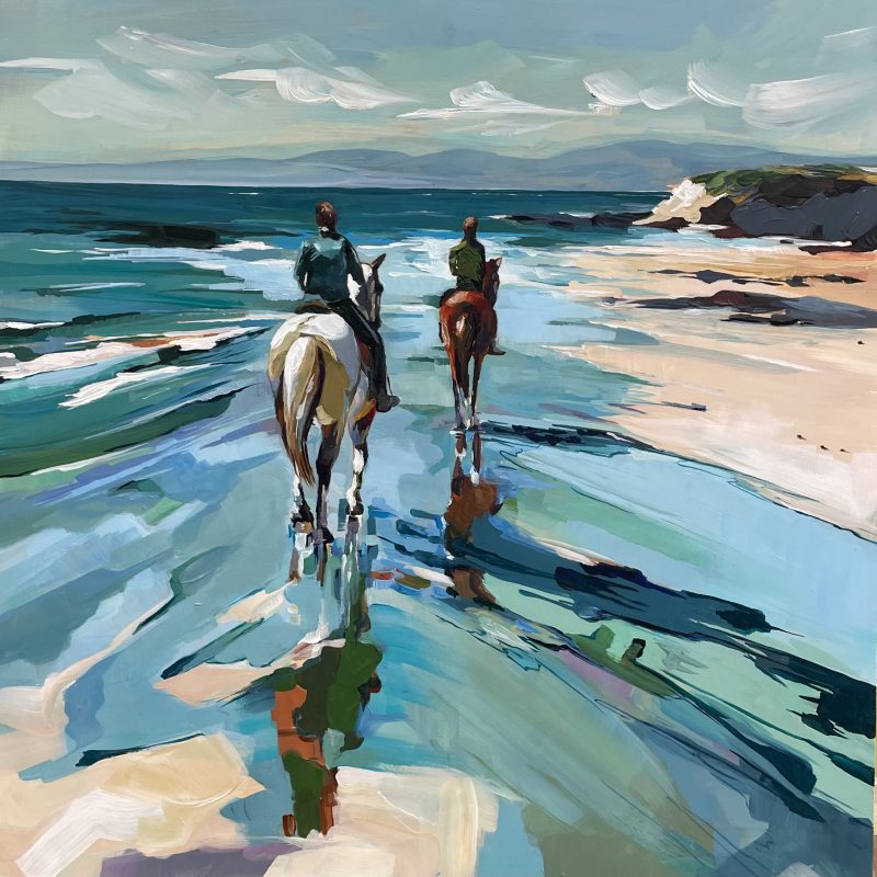Two horses and their riders on a beach with bold colours