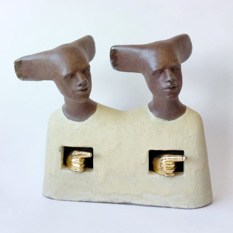 Double headed terracotta bust with good leaf hands