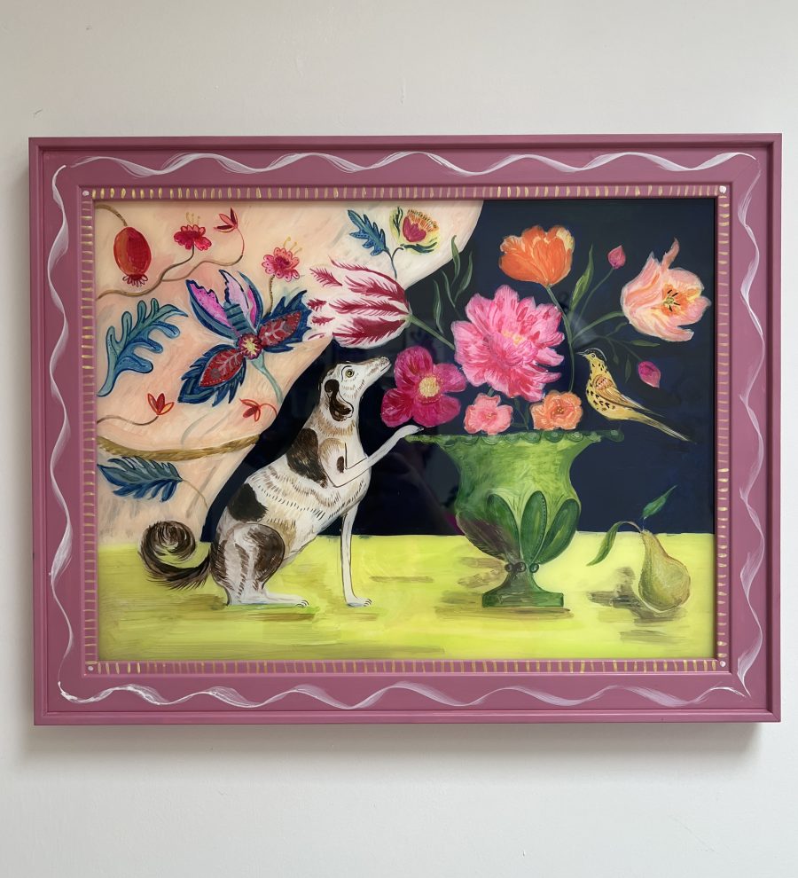 A dog sits with his paw on an urn of brightly coloured flowers which form part of a richly coloured bright still life