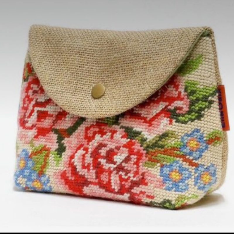 A small needle point embroidered pink rose purse recycled and reclaimed materials.