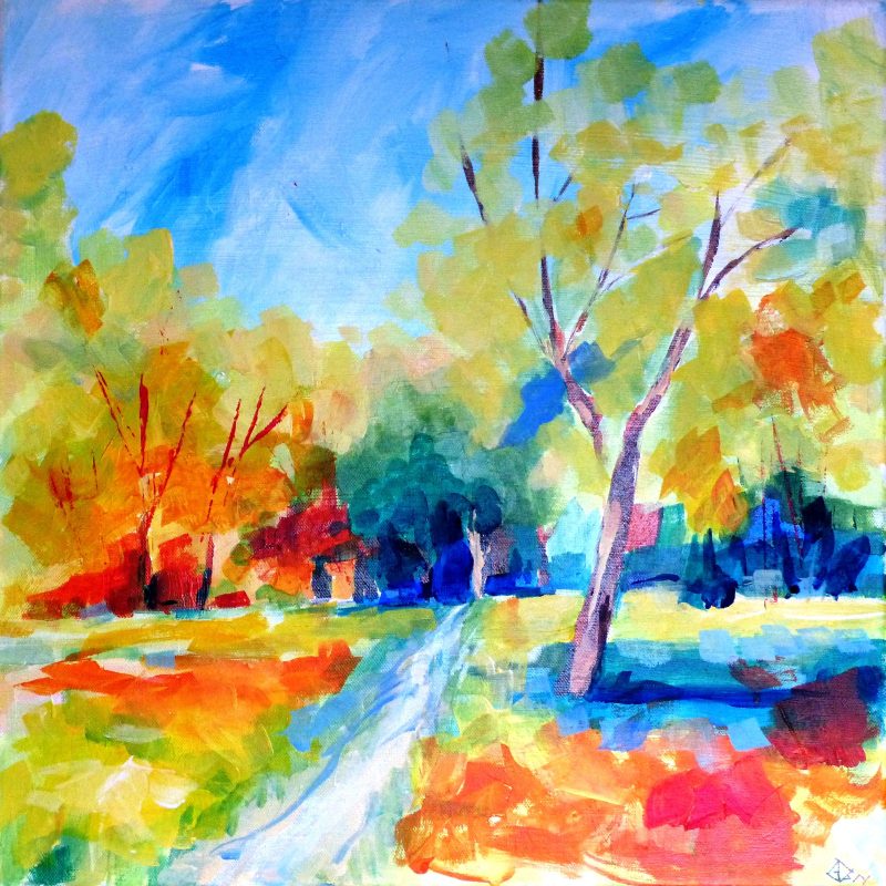 A landscape of trees in Autumn colour.