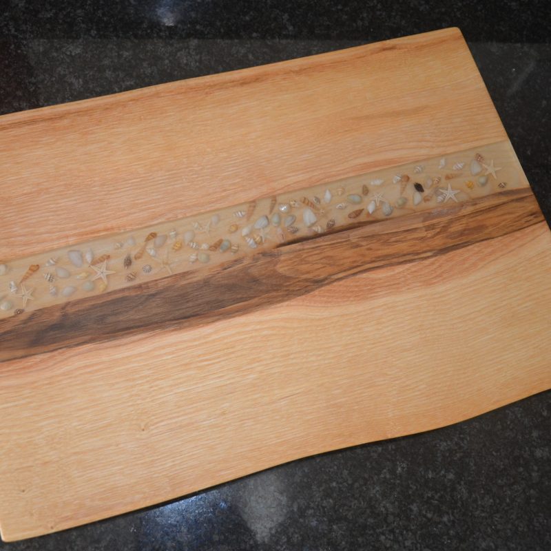 Customised Woodcraft e.g.chopping boards, serving trays, lamps, bird houses and clocks many with Resin decorations.