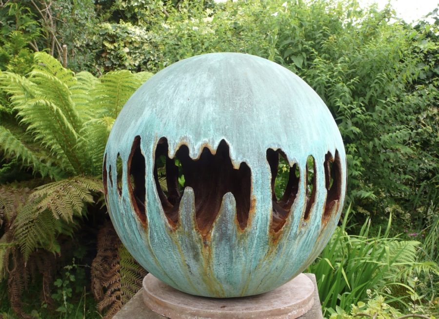 An oxidised and eroding sphere with copper interior 