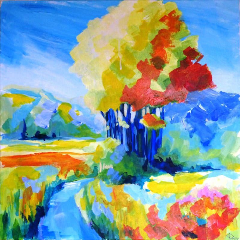 A landscape with a group of trees in the middle distance.