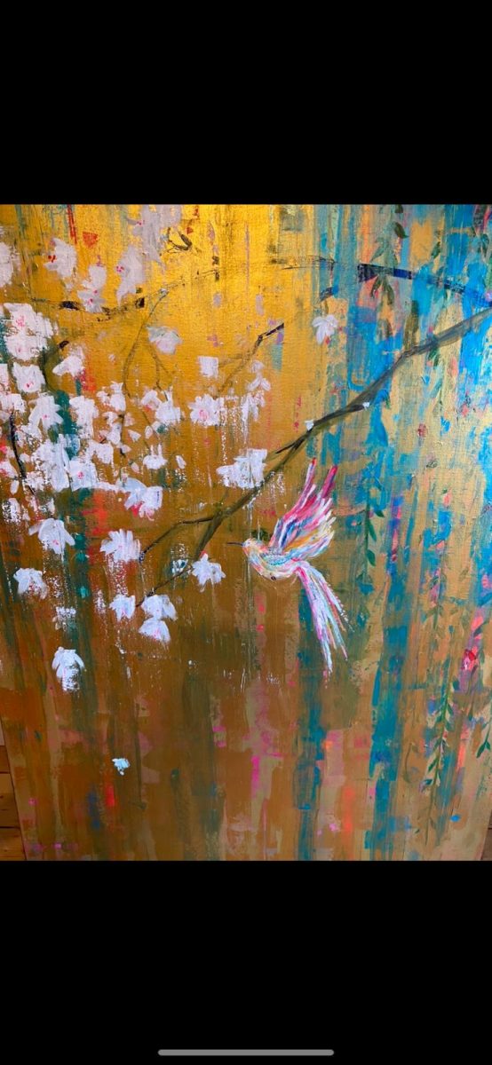 Gold and metallics shimmer behind the gently arched cherry blossom tree with a floating hummingbird quite central to the piece
