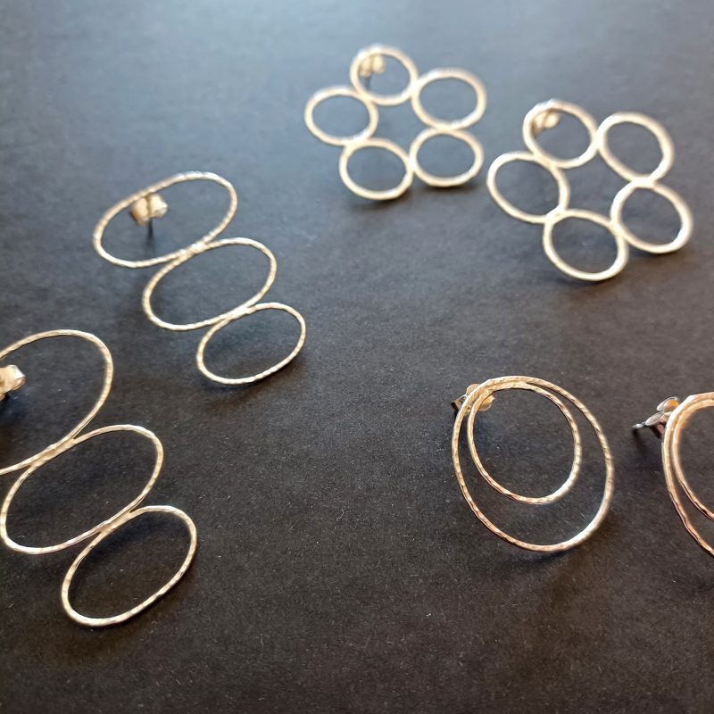 3 pairs of recycled silver hand crafted earrings in simple elegant geometric deseigns.