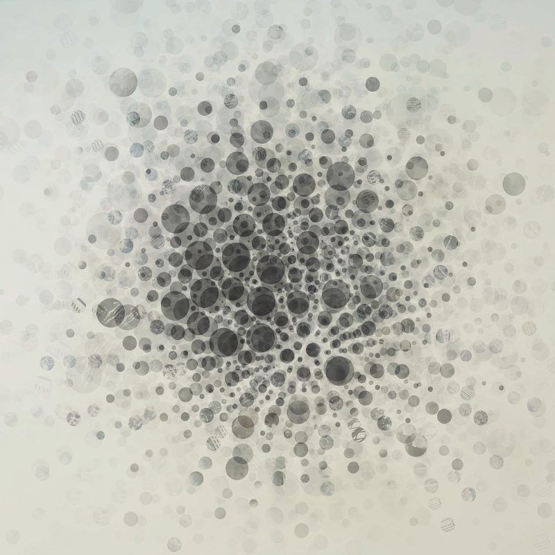 Collage comprised of shades of grey and black dots