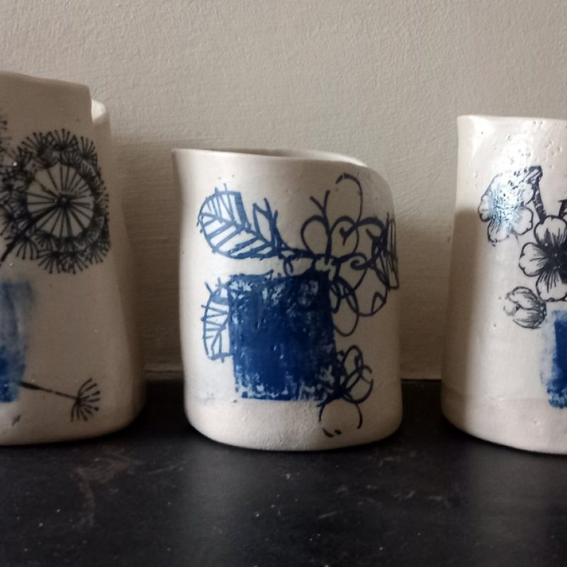 Ceramic jugs with blue printed patterns 