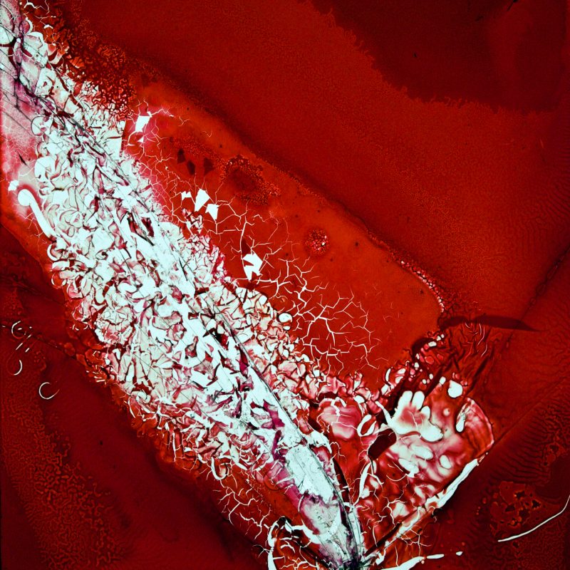 A square of rather distressed red glass.