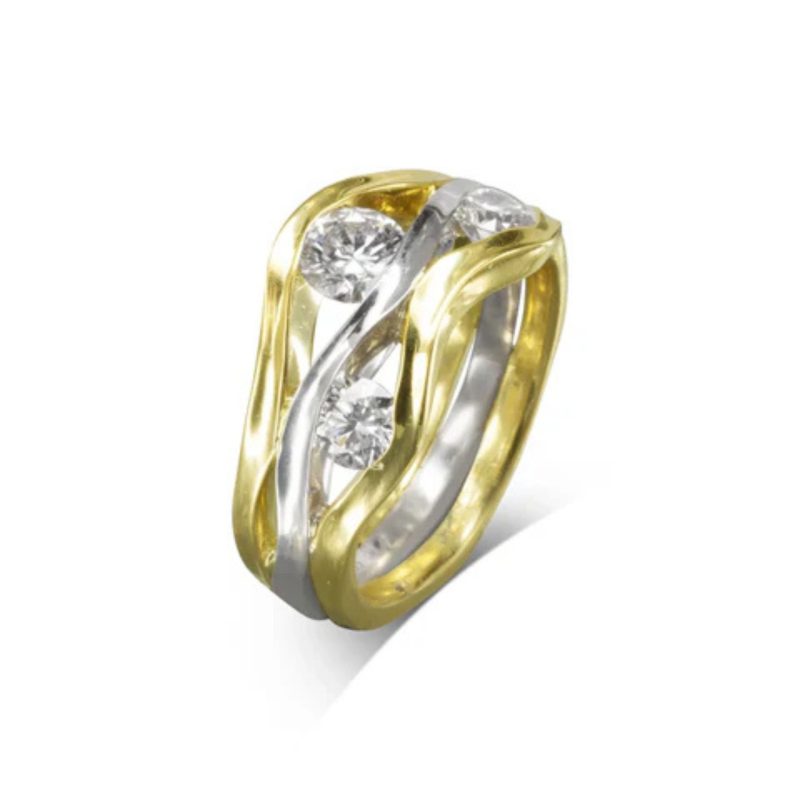 A ring made from three square wires that have been hammered on the side to make them undulating. Diamonds of various sizes are set between the bands. the outer two are yellow gold and the inner one is platinum.