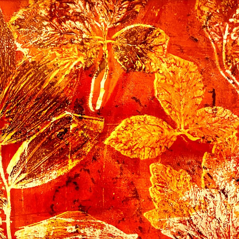 An abstract monoprint featuring textured leaves in vibrant reds and yellows. The artwork has a fiery, almost metallic appearance with intricate details.