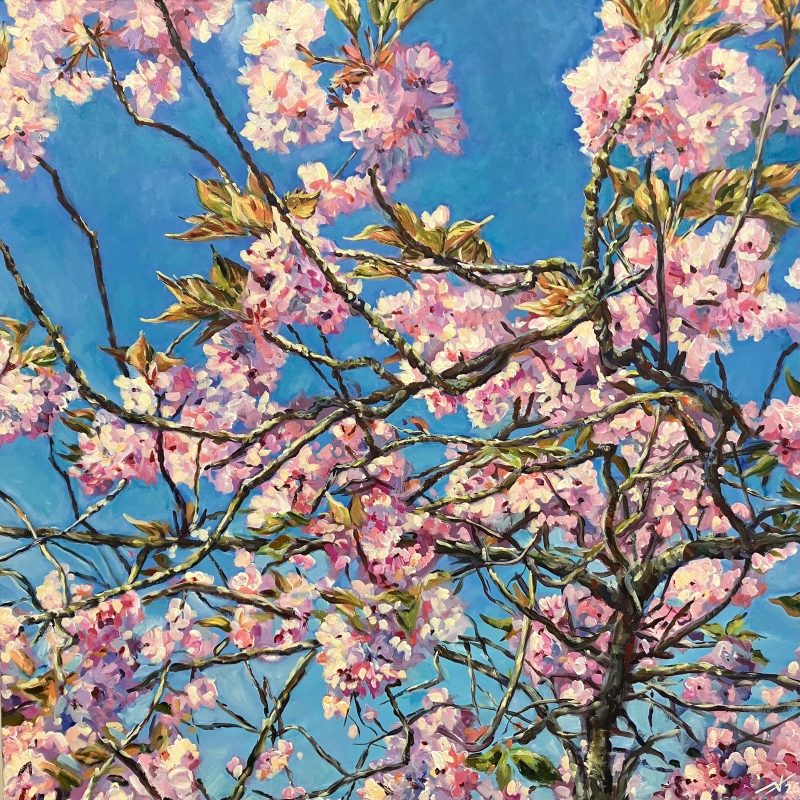 Pinks and blues dominate the picture. Branches weave across the canvas into every corner. As though looking up through the entanglement of cherry flowers in bloom, the blue sky showing through the gaps.