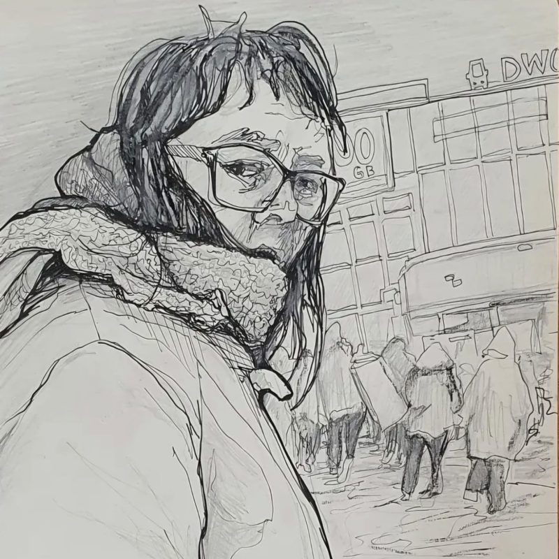 Woman looking sideways at viewer 