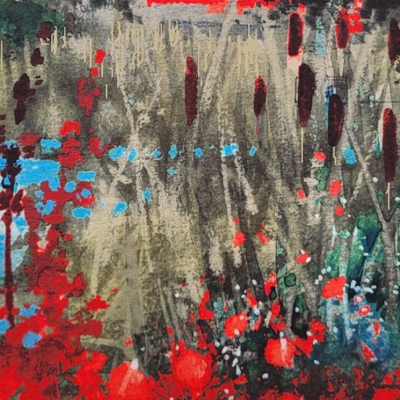 Red flowers against a blue and green background