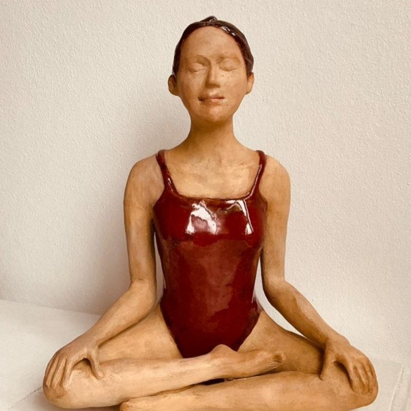 Yoga pose, calm, serene and captures the sitter just so. 