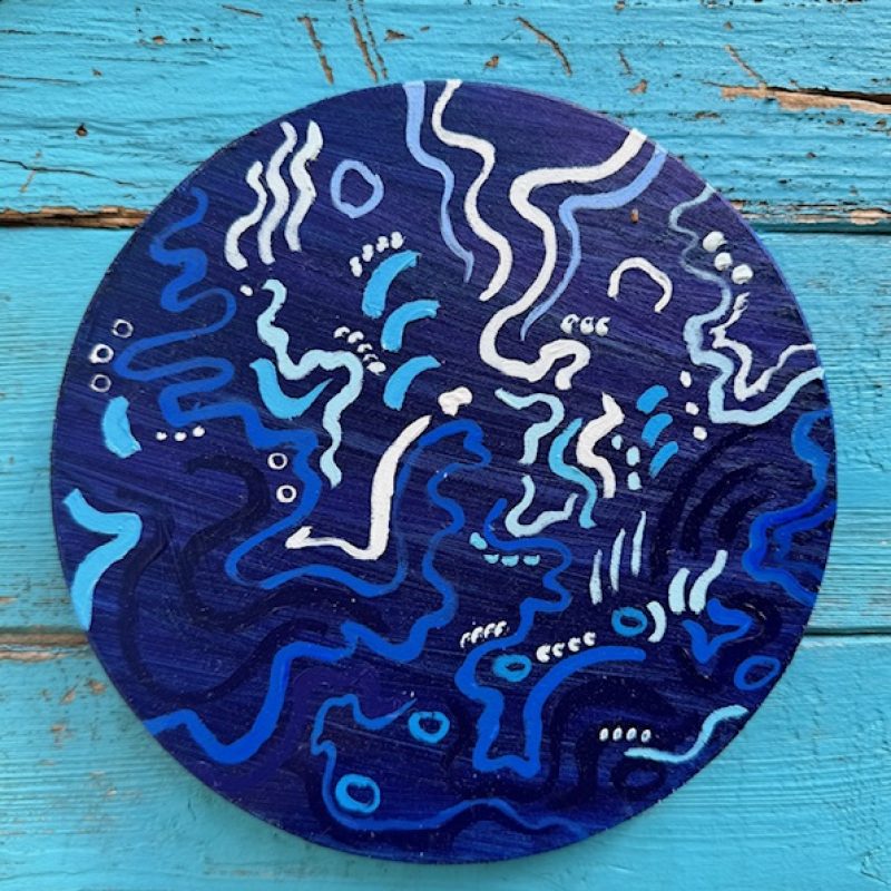 Blue disc with abstract musical marks