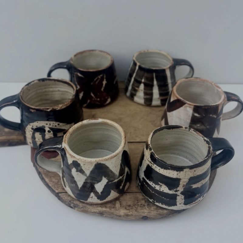 Ceramic Mugs glazed with bold marks in Dark Brown Black and Off White