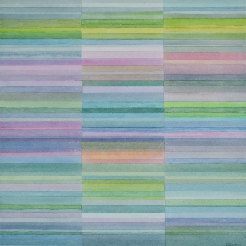 This square abstract painting is made of three columns of thin horizontal stripes in different widths and are in light shades of indigo, blue, green, grey and pink. The stripes go through one, two or all the columns across the painting. Most of the bands of colour have neat sharp edges (made using masking tape) but a few of them bleed into each other or are less carefully painted in contrast.