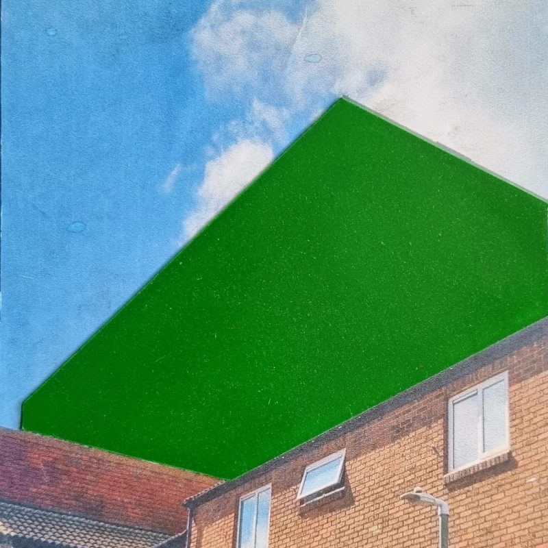 Building with green shape in the sky