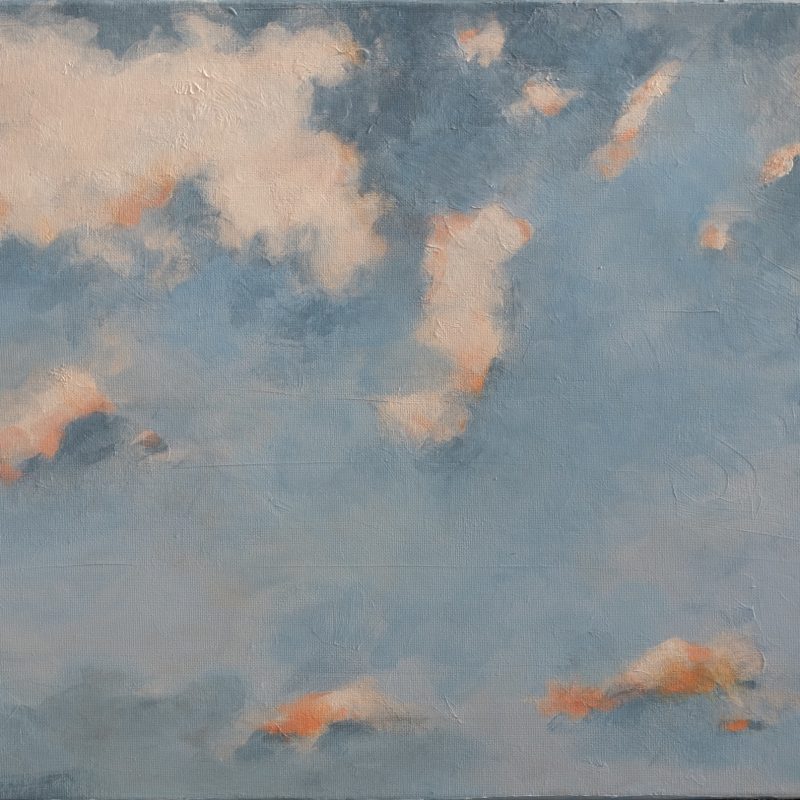 White and pink clouds against a beautiful blue background