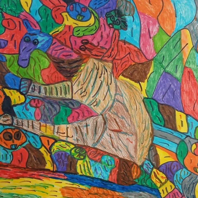 Colourful image showing horse and a rider in the landscape. 