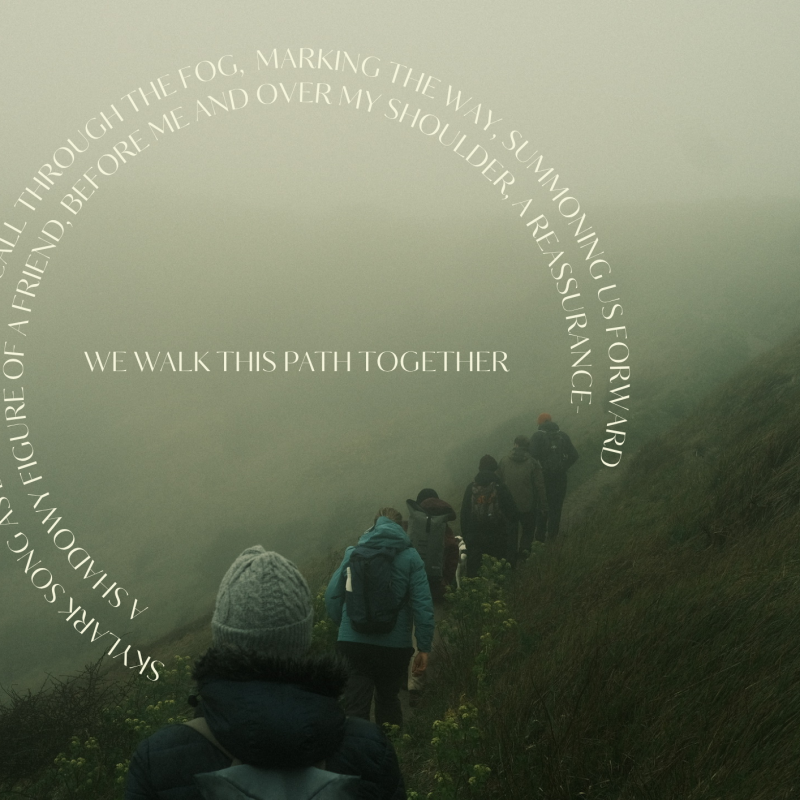 People walking on the downs with a poem overlaid